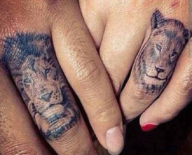 lion ring tattoo
