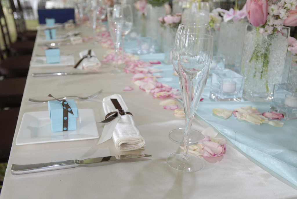 Wedding banquet table with baby blue gifts